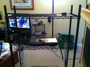 from on the treadmill desk - laptop goes top center next to the mouse